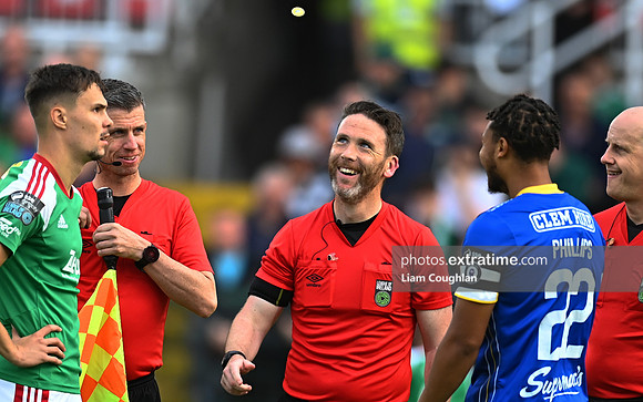 Referee Eoghan O'Shea with Cian Coleman and Giles Phillips.