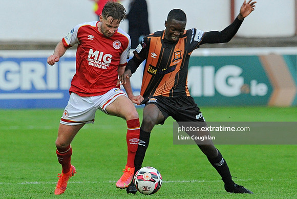 Billy King tussles with Val Adeddokun for posession.