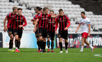 Bohemian players congratulate Anto Breslin after scoring their opening goal