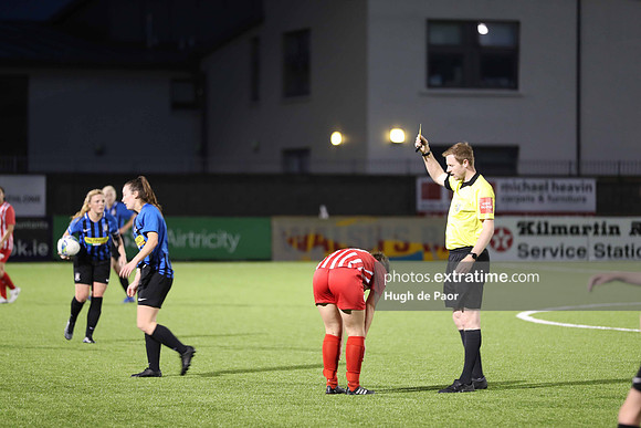 REFEREE GIVES YELLOW CARD TO ATHLONE PLAYER