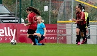 Kate Burdis DLR Waves  goes to ground to stop Aoife Robinson of Bohemian WFC