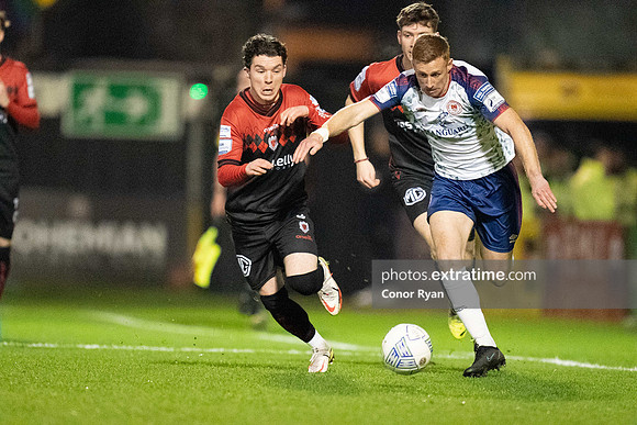 Eoin Doyle of St Patrick's Athletic bursts past Ali Coote of Bohemian FC